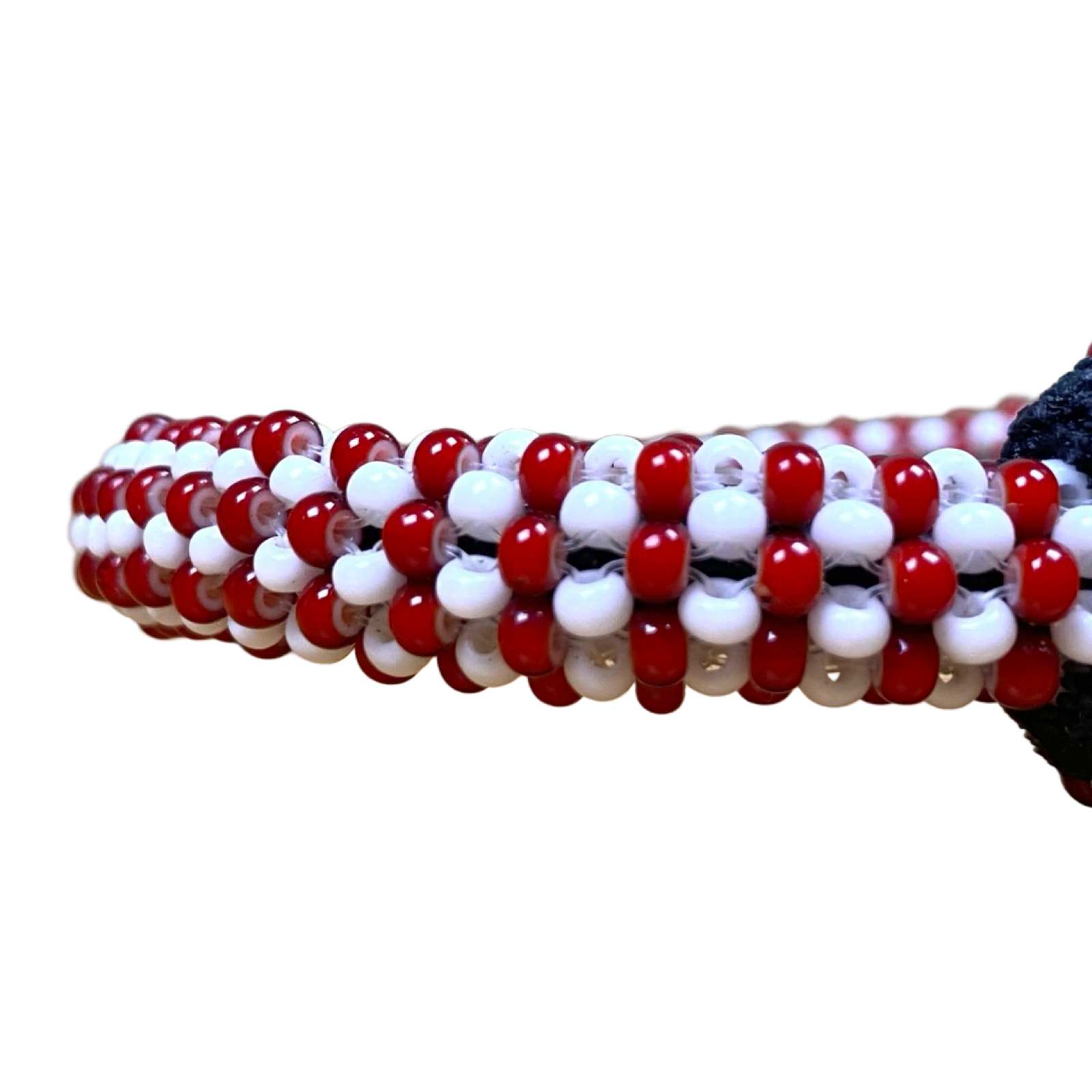 Detail of red and white bead craftsmanship on the Ilde de Shango.