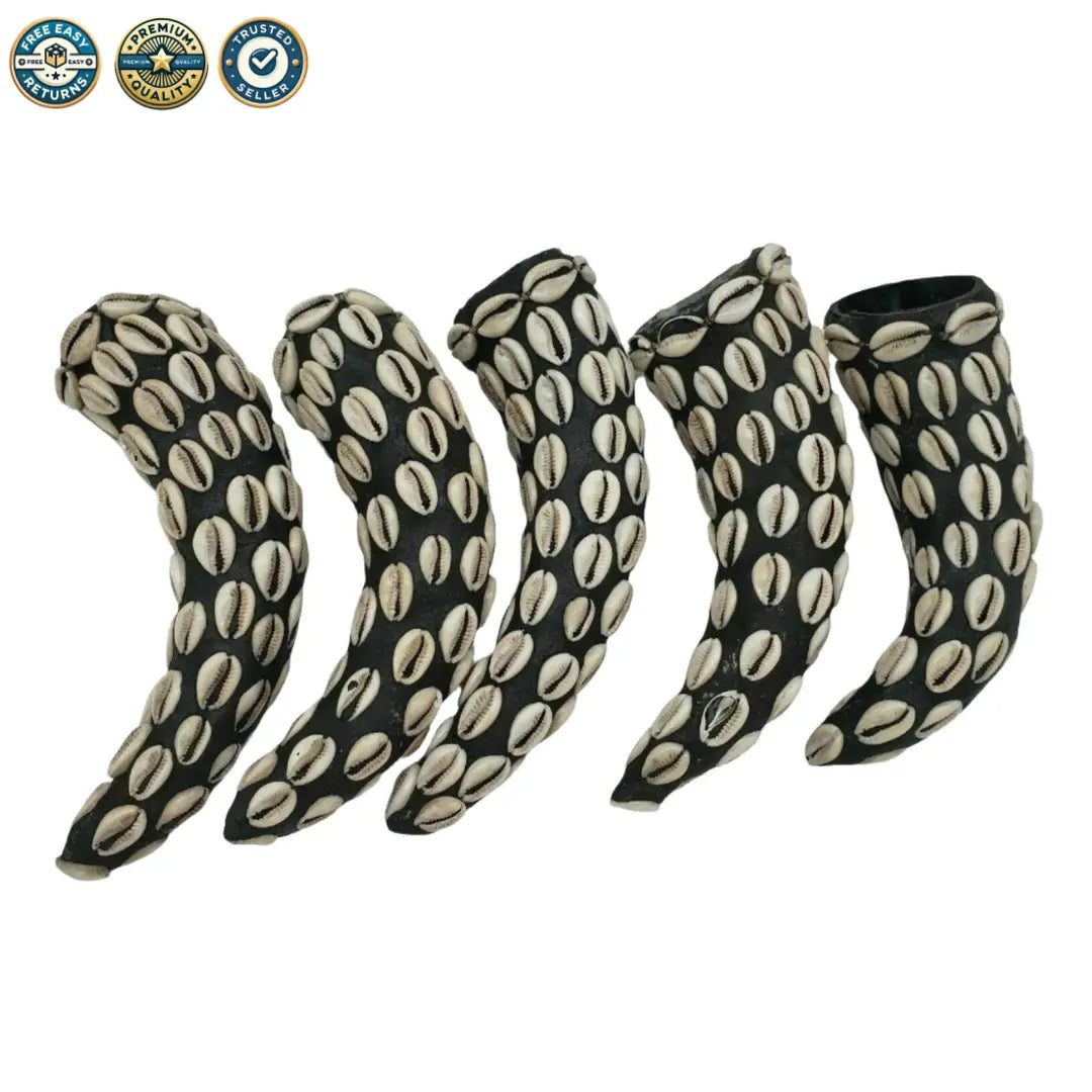 Mpaka Enroscada con Conchas de Cauri – Amuleto para Protección y Conexión Espiritual (Mpaka Wrapped with Cowrie Shells – Amulet for Protection and Spiritual Connection) - SanteriaGuide