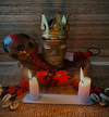 an elegua alter with, ambient llighting