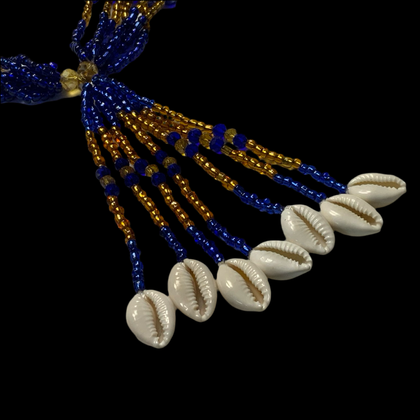 A crystal mazo de ochosi with blue, green, and silver beads, and symbols such as arrows, arches, and leaves.