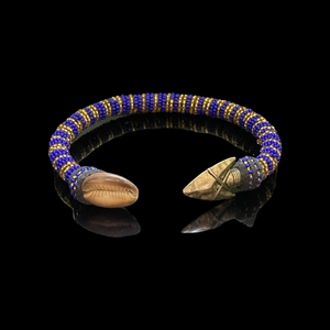 Ilde de Ochosi – Conchas de Cauri y Bronce (Pulsera Ochosi – Conchas de Cauri y Bronce)