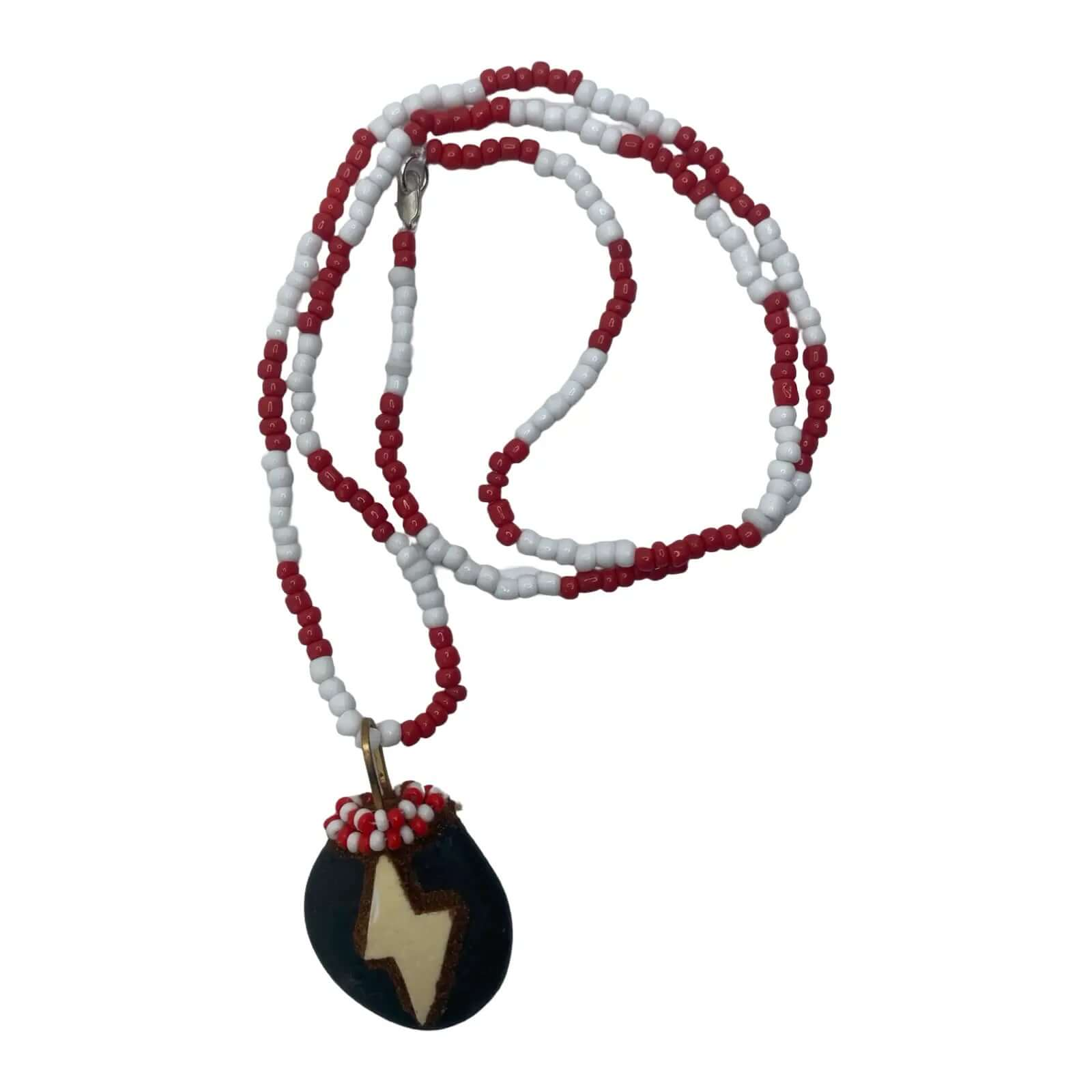 Eleke de Shangó crafted with red and white beads and thunderstones.